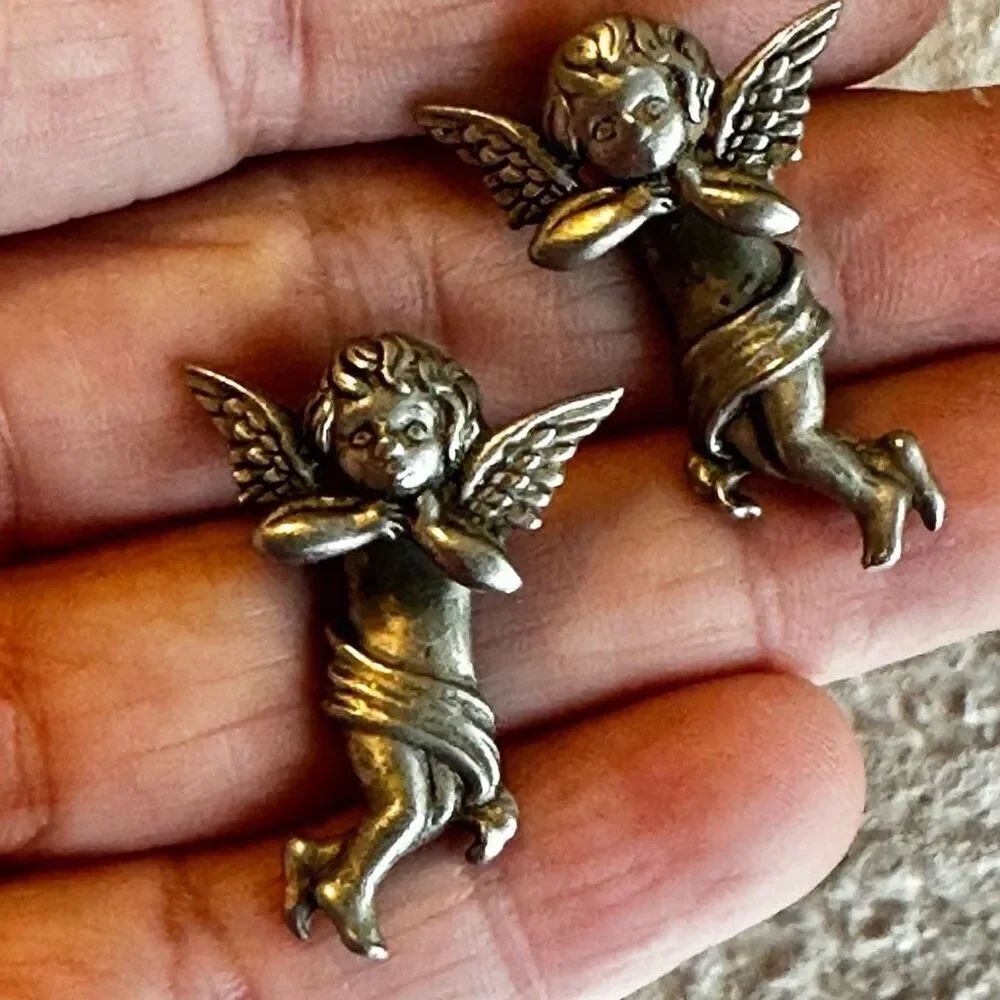 JJ Jonette removable cherub silver tone earrings